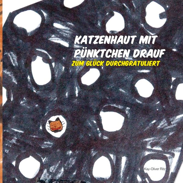 Cover von Katzenhaut mit Pünktchen drauf